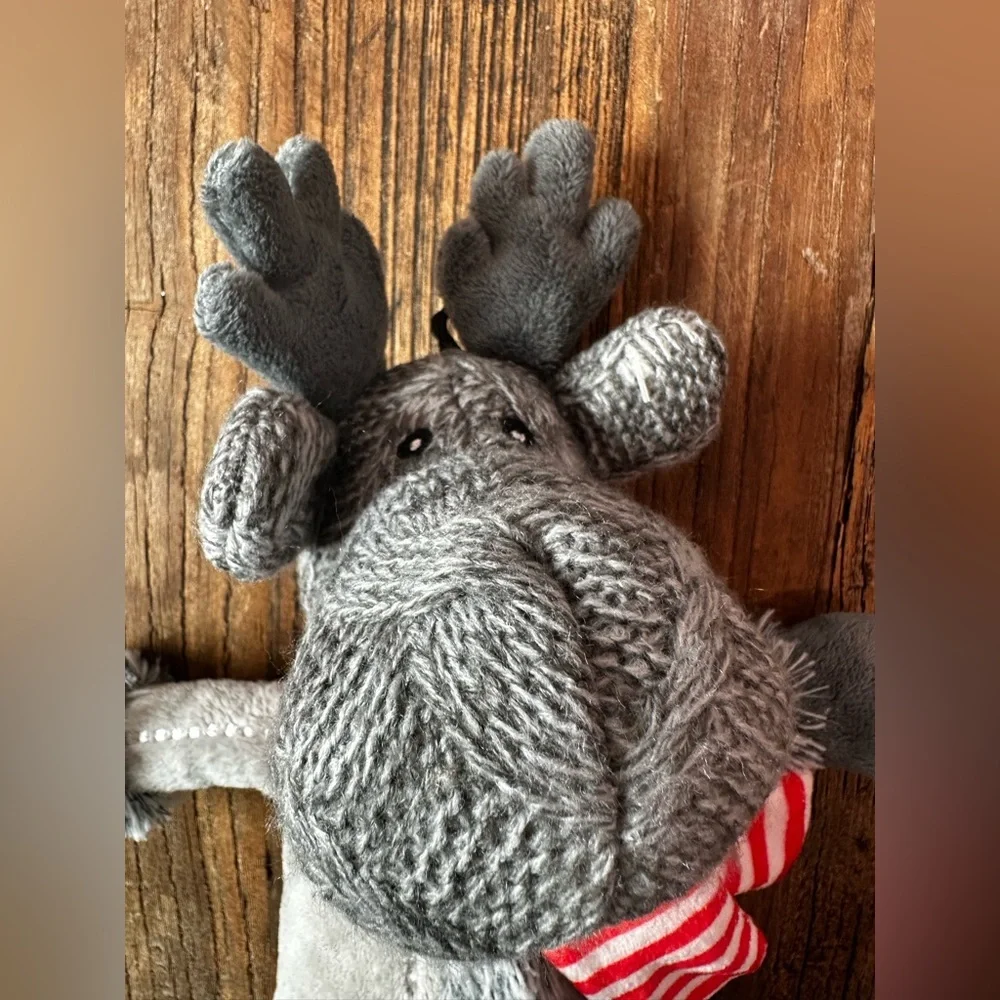 Gray Plush Toy with Red Star and Striped Scarf